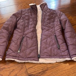 Purple puffer and reversible pink furry jacket